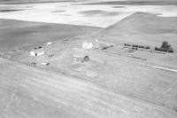 Aerial photograph of a farm near Borden, SK (41-8-W3)