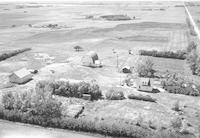 Aerial photograph of a farm near Cutknife, SK (43-22-W3)