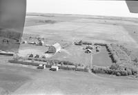 Aerial photograph of a farm near Hafford, SK (44-10-W3)