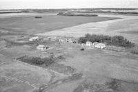 Aerial photograph of a farm near Blaine Lake, SK (45-7-W3)