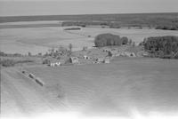 Aerial photograph of a farm near Paradise Hill, SK (52-23-W3)