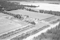 Aerial photograph of a farm near Senlac, SK