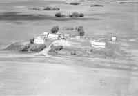 Aerial photograph of a farm near Turtleford, SK (51-20-W3)