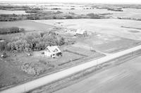 Aerial photograph of a farm near Prince, SK (24-46-17-W3)