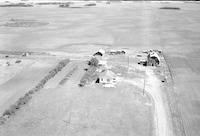 Aerial photograph of a farm near Maidstone, SK (23-47-23-W3)