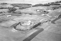 Aerial photograph of a farm near Keatley, SK (44-11-W3)