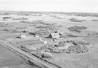 Aerial photograph of a farm near Speers, SK (44-11-W3)