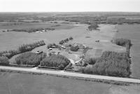 Aerial photograph of a farm near Hafford, SK (44-10-W3)