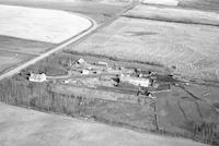 Aerial photograph of a farm near Blaine Lake, SK (4-44-7-W3)