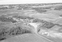 Aerial photograph of a farm near Radisson, SK (6-42-9-W3)