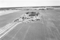 Aerial photograph of a farm near Borden, SK (4-41-9-W3)
