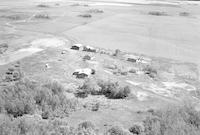 Aerial photograph of a farm near Blaine Lake, SK (45-7-W3)