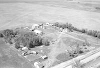 Aerial photograph of a farm near Paradise Hill, SK (52-23 or 24-W3)