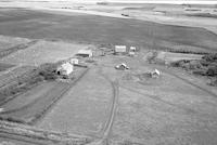 Aerial photograph of a farm near Butte St. Pierre, SK (1-52-24-W3)