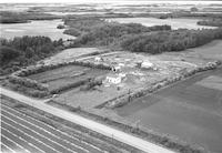 Aerial photograph of a farm near Hafford, SK (44-10-W3)