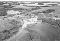 Aerial photograph of a farm near Richard, SK (44-12-W3)