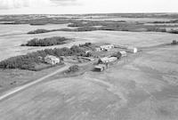 Aerial photograph of a farm near Richard, SK (44-12-W3)