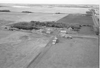Aerial photograph of a farm near Northbattleford, SK (47-5-W3)