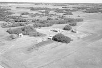 Aerial photograph of a farm near St. Walburg, SK