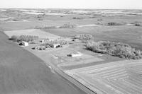 Aerial photograph of a farm near Paradise Hill, SK (34-51-24-W3)