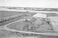 Aerial photograph of a farm near Paradise Hill, SK (26-52-24-W3)