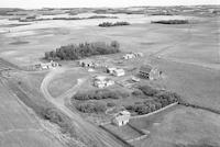 Aerial photograph of a farm near Borden, SK (41-9-W3)