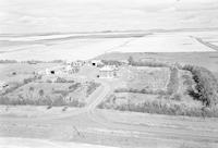 Aerial photograph of a farm near South Makwa, SK (58-20-W3)