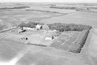 Aerial photograph of a farm near Heath, Alta