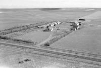 Aerial photograph of a farm near Cutknife, SK (12-44-22-W3)