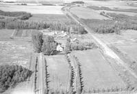 Aerial photograph of a farm near Maidstone, SK (37-23-W3)