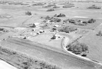 Aerial photograph of a farm near Wilkie, SK (23-40-19-W3)