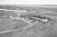 Aerial photograph of a farm near Maymont, SK (41-12-W3)