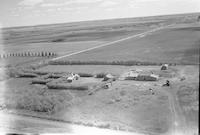 Aerial photograph of a farm in Saskatchewan (39-37-W3)