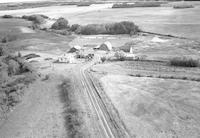 Aerial photograph of a farm in Saskatchewan (34-21-W3)