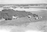 Aerial photograph of a farm near Borden, SK (40-8-W3)