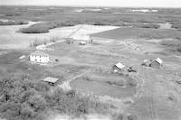 Aerial photograph of a farm near Ferrobert, SK (34-21-W3)