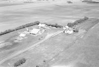 Aerial photograph of a farm near Borden, SK (41-8-W3)