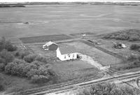 Aerial photograph of a farm near Fielding, SK (28-41-11-W3)