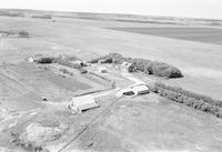 Aerial photograph of a farm near Vera, SK (17-42-23-W3)