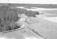 Aerial photograph of a farm near Keatley, SK (44-11-W3)