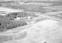 Aerial photograph of a farm near N. Makwa, SK (58-20-W3)