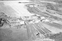 Aerial photograph of a farm near S. Makwa, SK (58-20-W3)