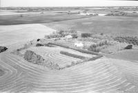 Aerial photograph of a farm near Tallman, SK (21-44-7-W3)