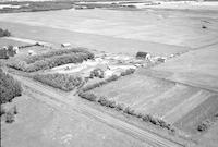 Aerial photograph of a farm in Saskatchewan (43-15-W3)