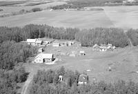 Aerial photograph of a farm near Blaine Lake, SK (30-44-7-W3)