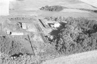 Aerial photograph of a farm near Blaine Lake, SK (22-44-7-W3)