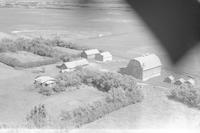 Aerial photograph of a farm near Blaine Lake, SK (45-7-W3)