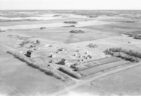 Aerial photograph of a farm near Blaine Lake, SK (45-7-W3)