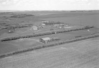 Aerial photograph of a farm in Saskatchewan (30-44-7-W3)