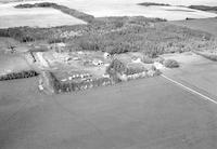Aerial photograph of a farm near Prince Albert, SK